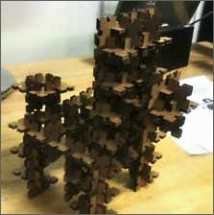 Z kartonové skládačky GIK, kterou vymyslela a vyrobila osmiletá dvojčata v bostonské Fab Lab, lze sestavit téměř cokoli.
