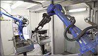 Dva roboty Motoman od firmy Yaskawa