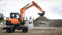 Doosan uvádí na trh nové kolové rypadlo DX57W-7 Doosan uvádí na trh nové kolové rypadlo DX57W-7