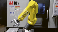 Šestiosý robot spolupracující se soustružnickým centrem ST-10L /Foto: Haas/ Šestiosý robot spolupracující se soustružnickým centrem ST-10L /Foto: Haas/